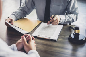 consultation with defense attorney discussing the criminal burden of proof